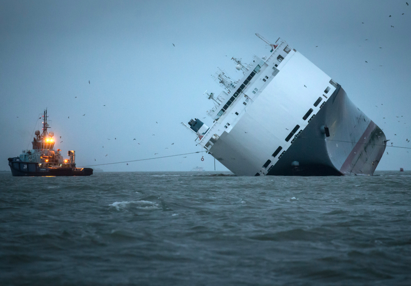 Illustration for article titled These Photos Of That Grounded Car Carrier Ship Are Beautifully Surreal